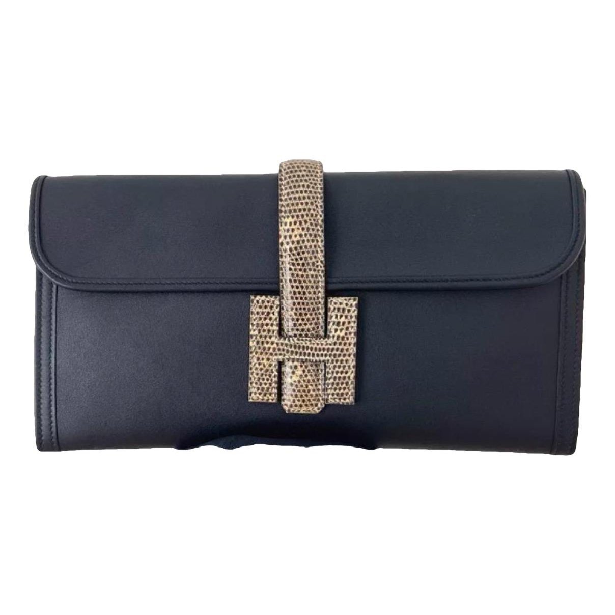 Jige leather clutch bag