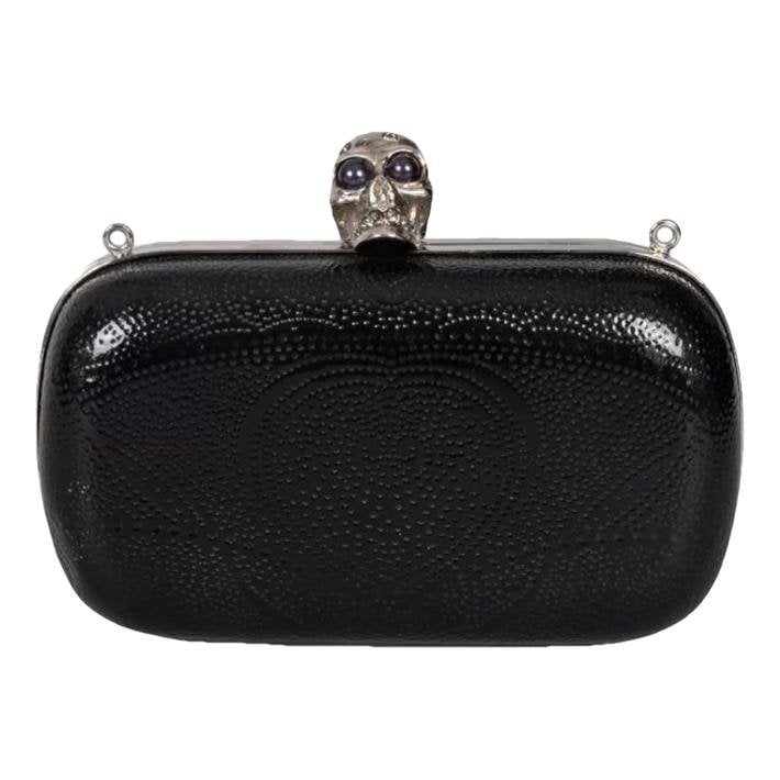 Alexander McQueen Skull leather clutch bag