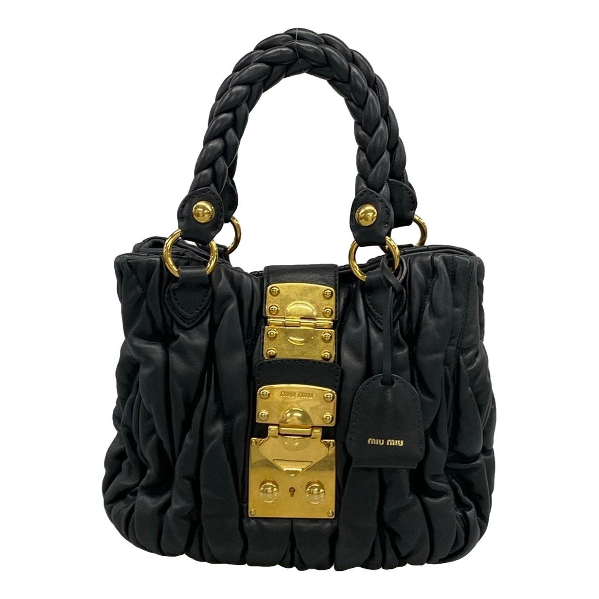 Matelassé leather handbag