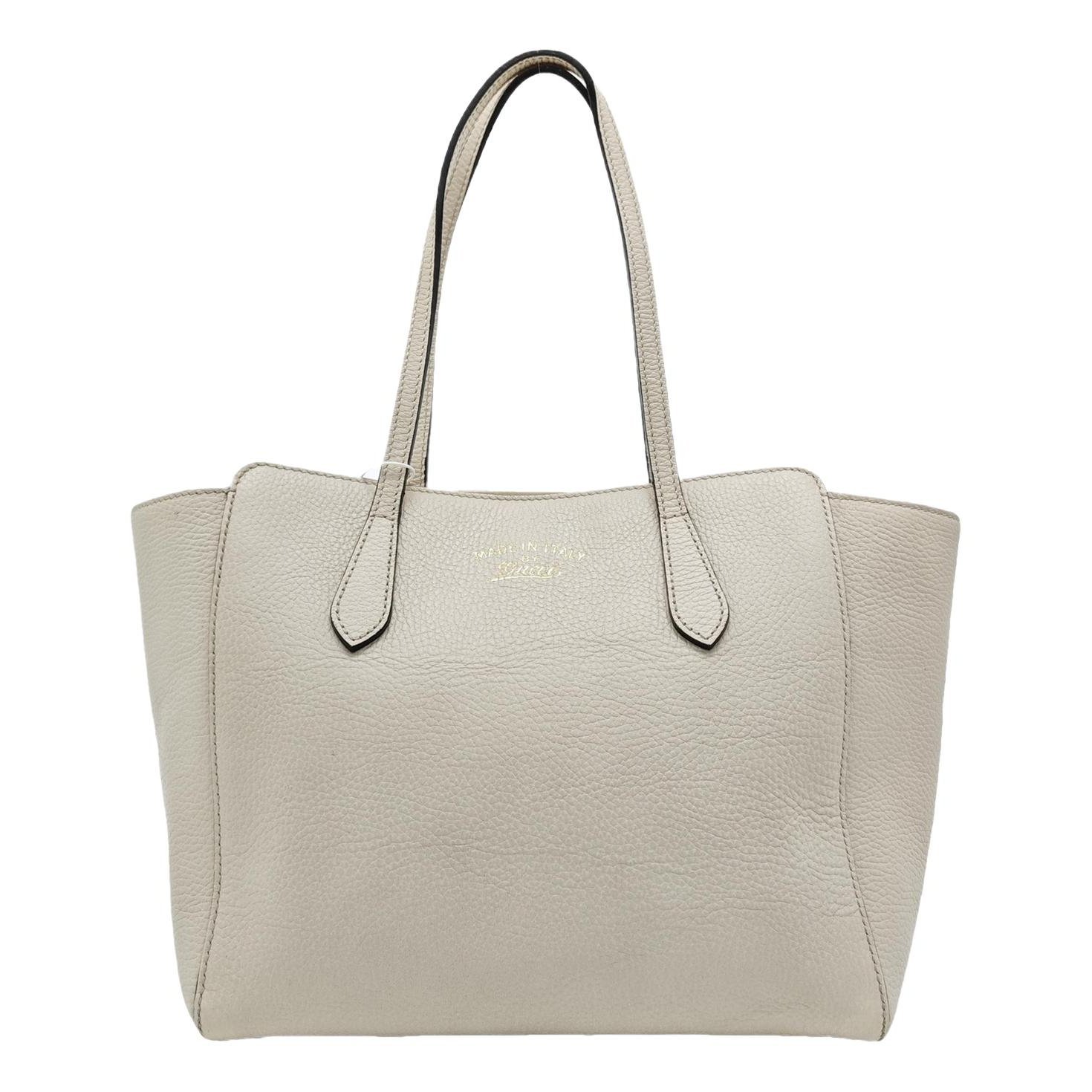 Swing leather handbag