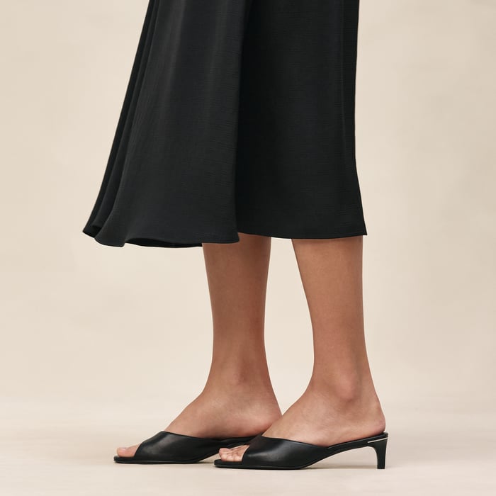 Noir "H Kelly" Flared Asymmetric Skirt