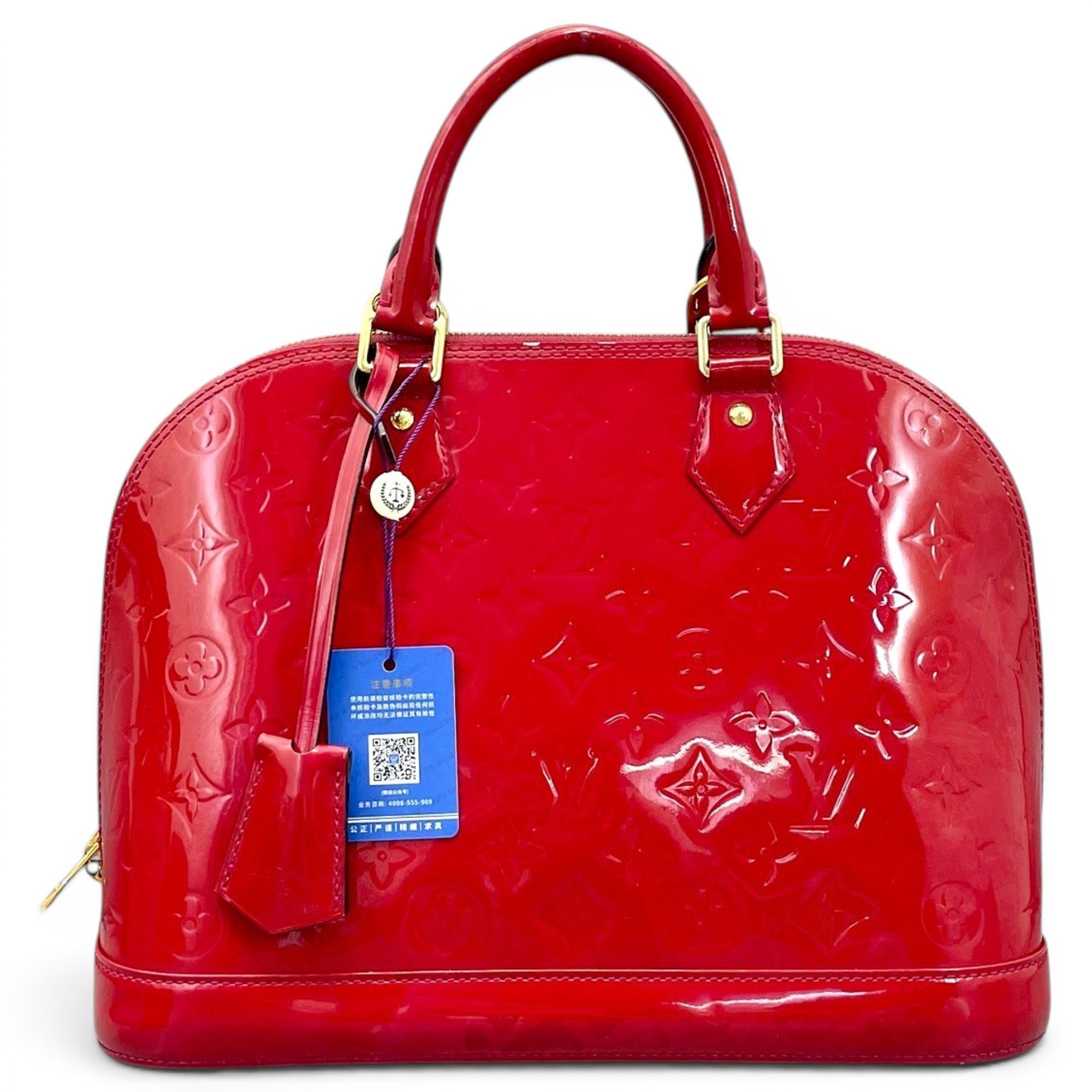 Alma patent leather handbag