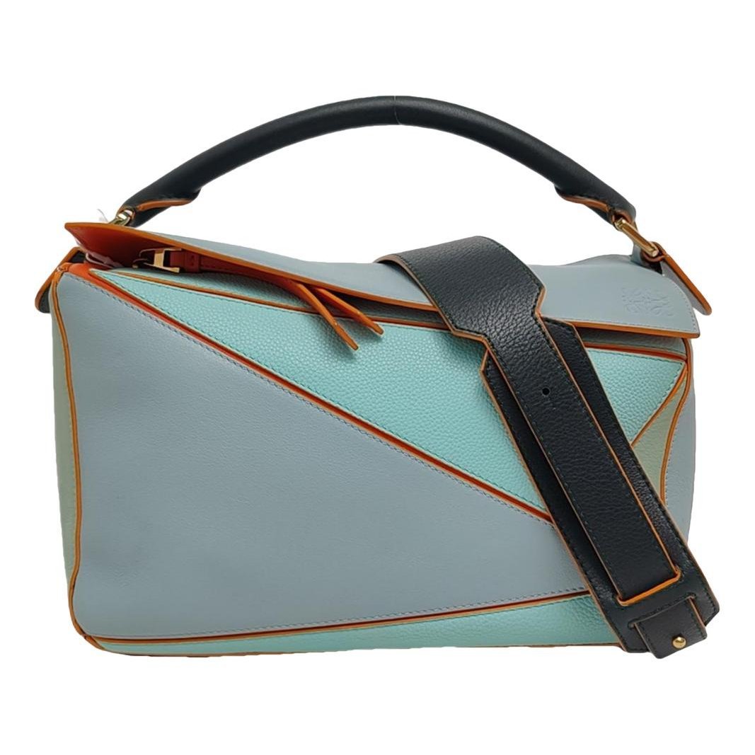 Puzzle leather handbag