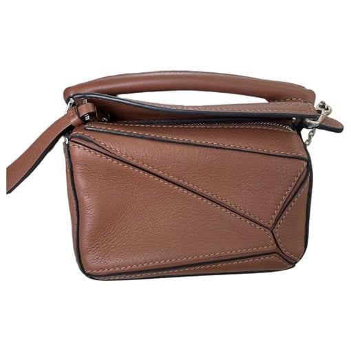 Puzzle leather handbag
