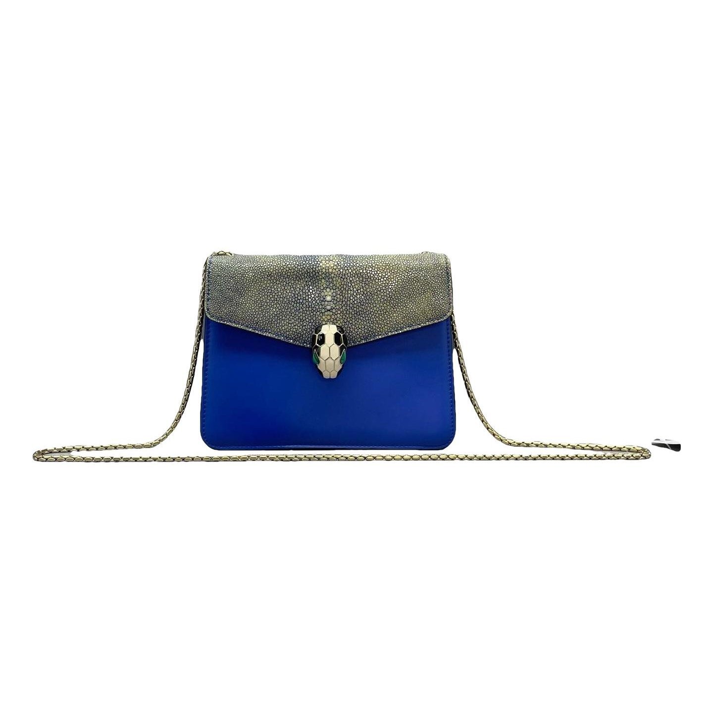 Serpenti leather handbag