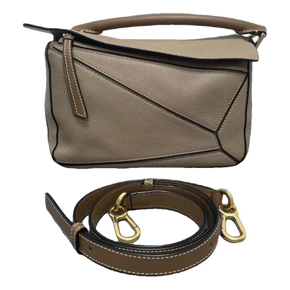 Puzzle leather crossbody bag