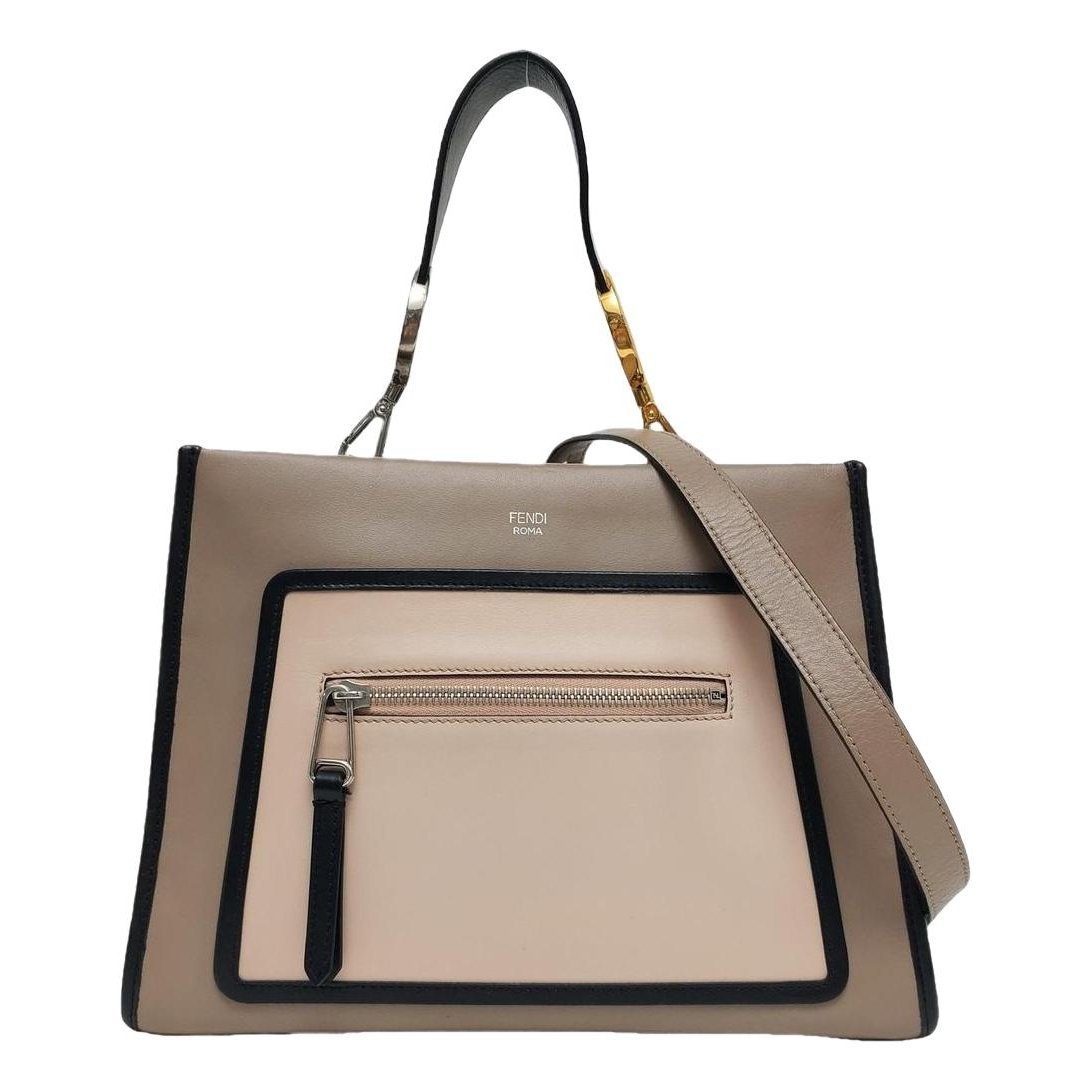 Runaway leather handbag