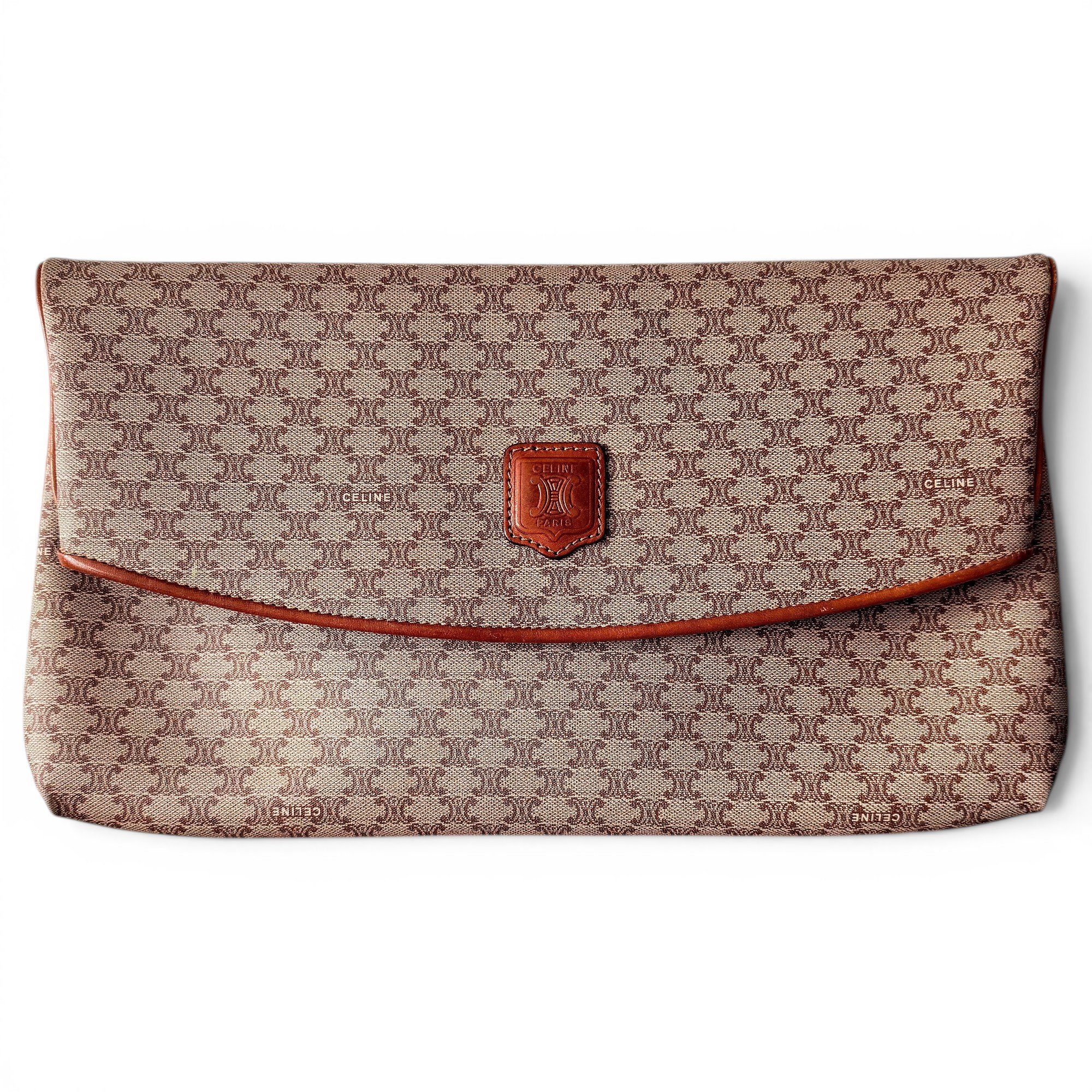 Triomphe Vintage leather clutch bag