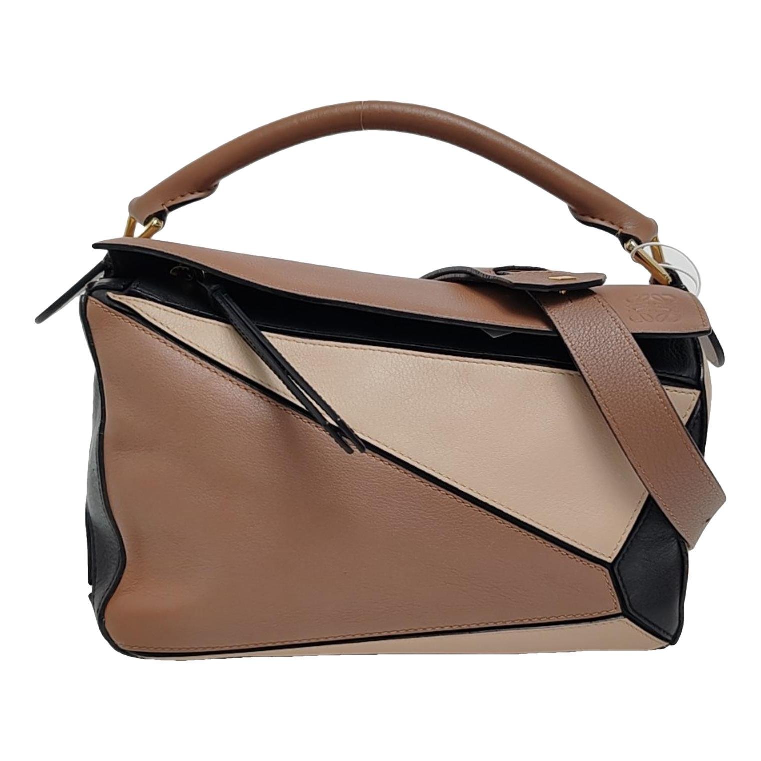 Puzzle leather crossbody bag