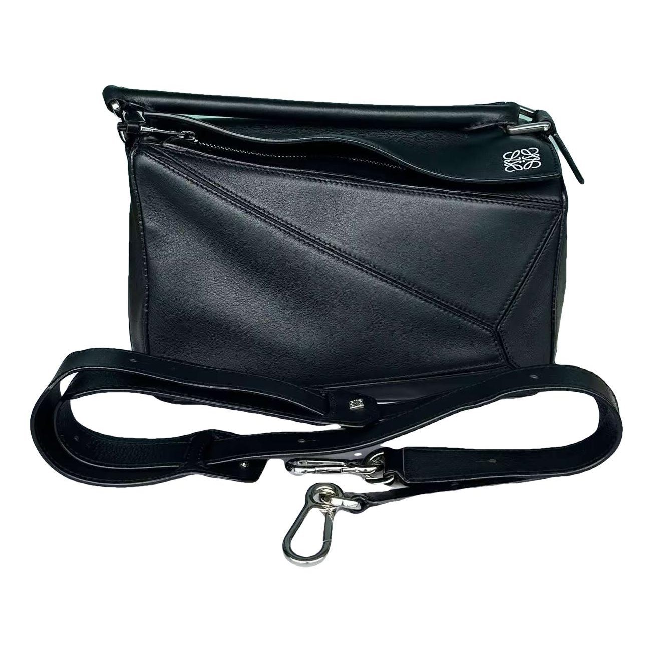 Puzzle leather handbag