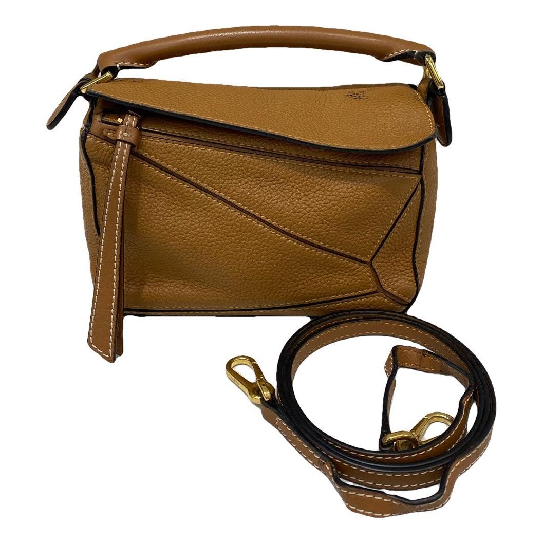 Puzzle leather handbag
