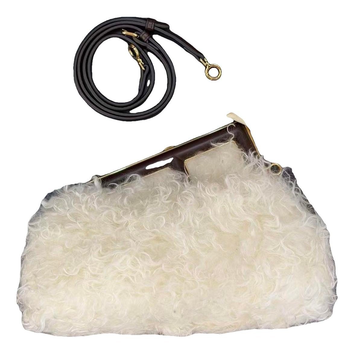 First faux fur crossbody bag