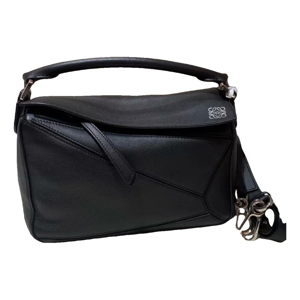 Puzzle leather handbag