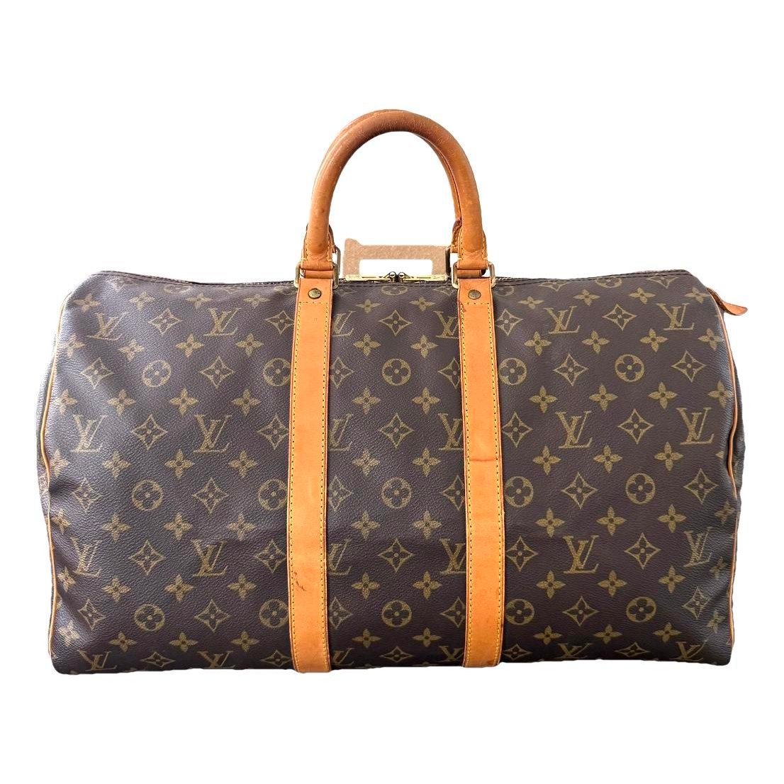 Keepall patent leather travel bag