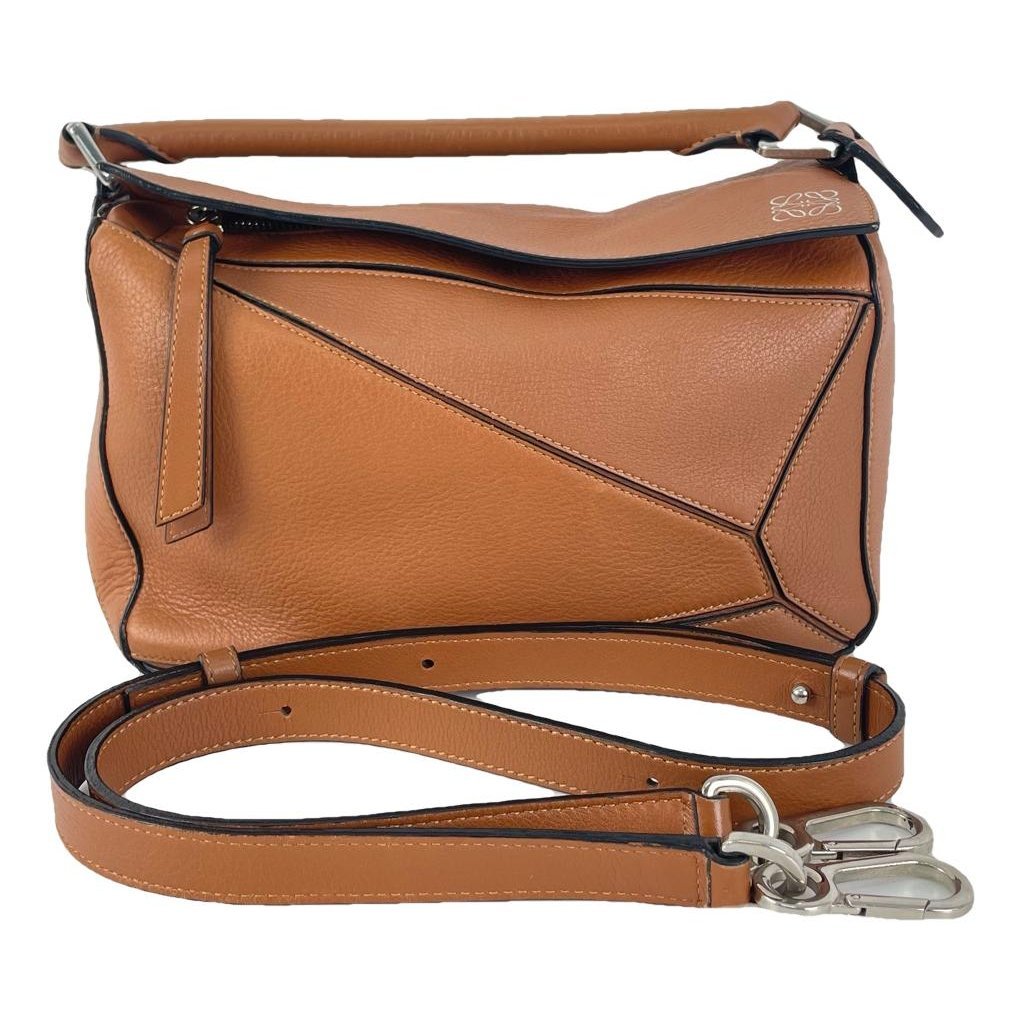 Puzzle leather handbag