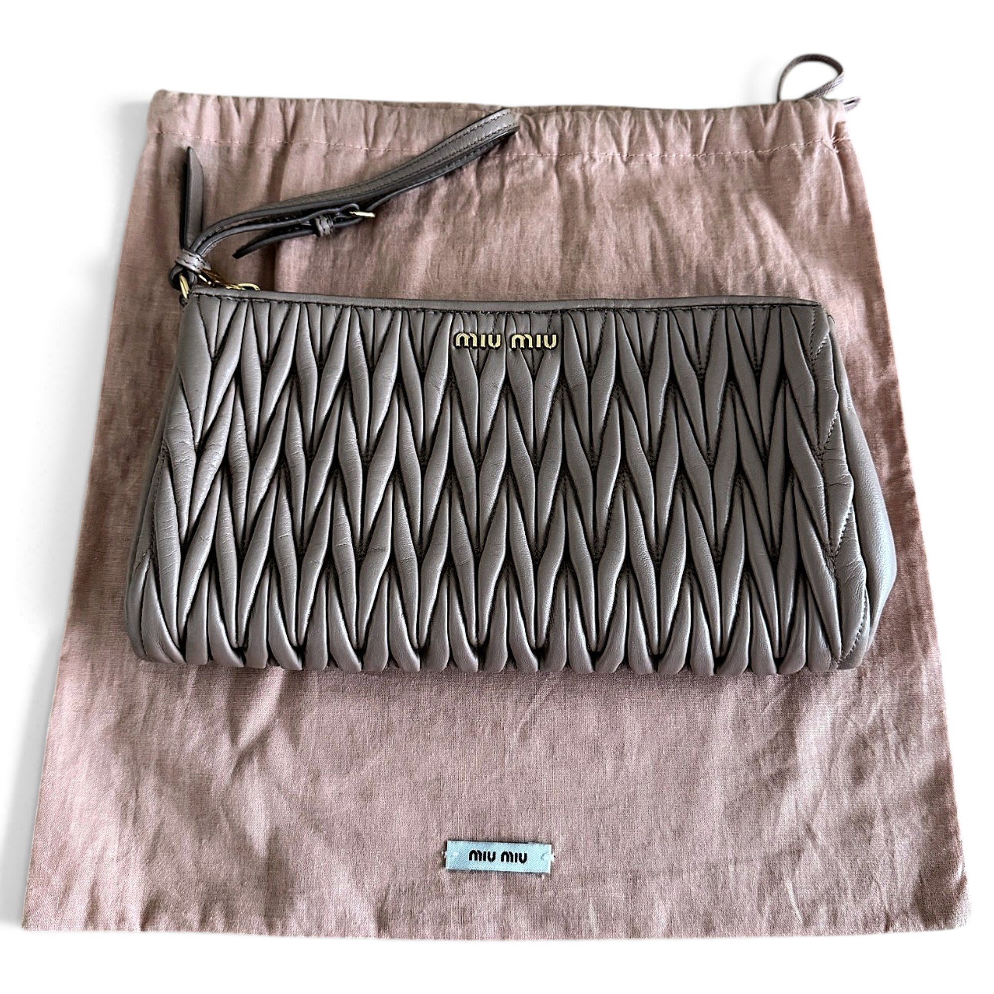 Matelassé leather clutch bag