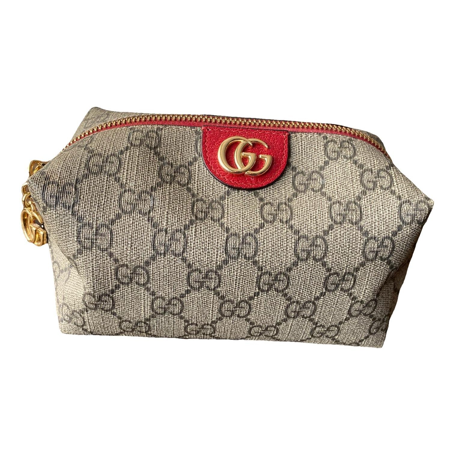 Ophidia leather clutch bag