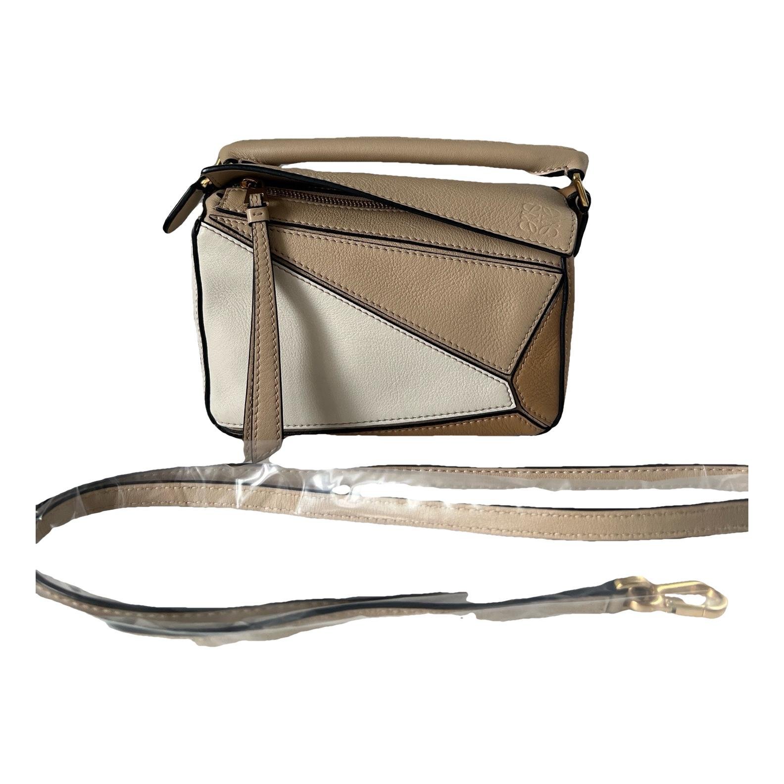 Puzzle leather handbag