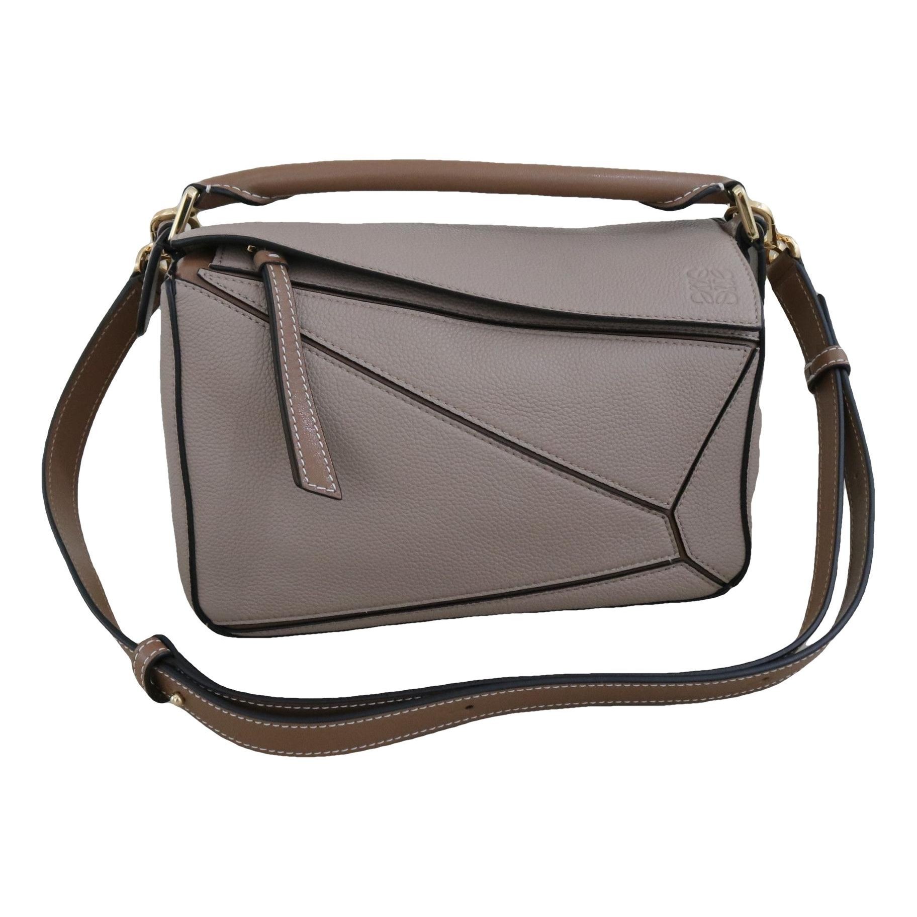 Puzzle leather handbag