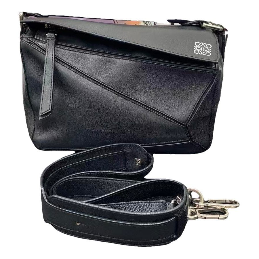 Puzzle leather handbag