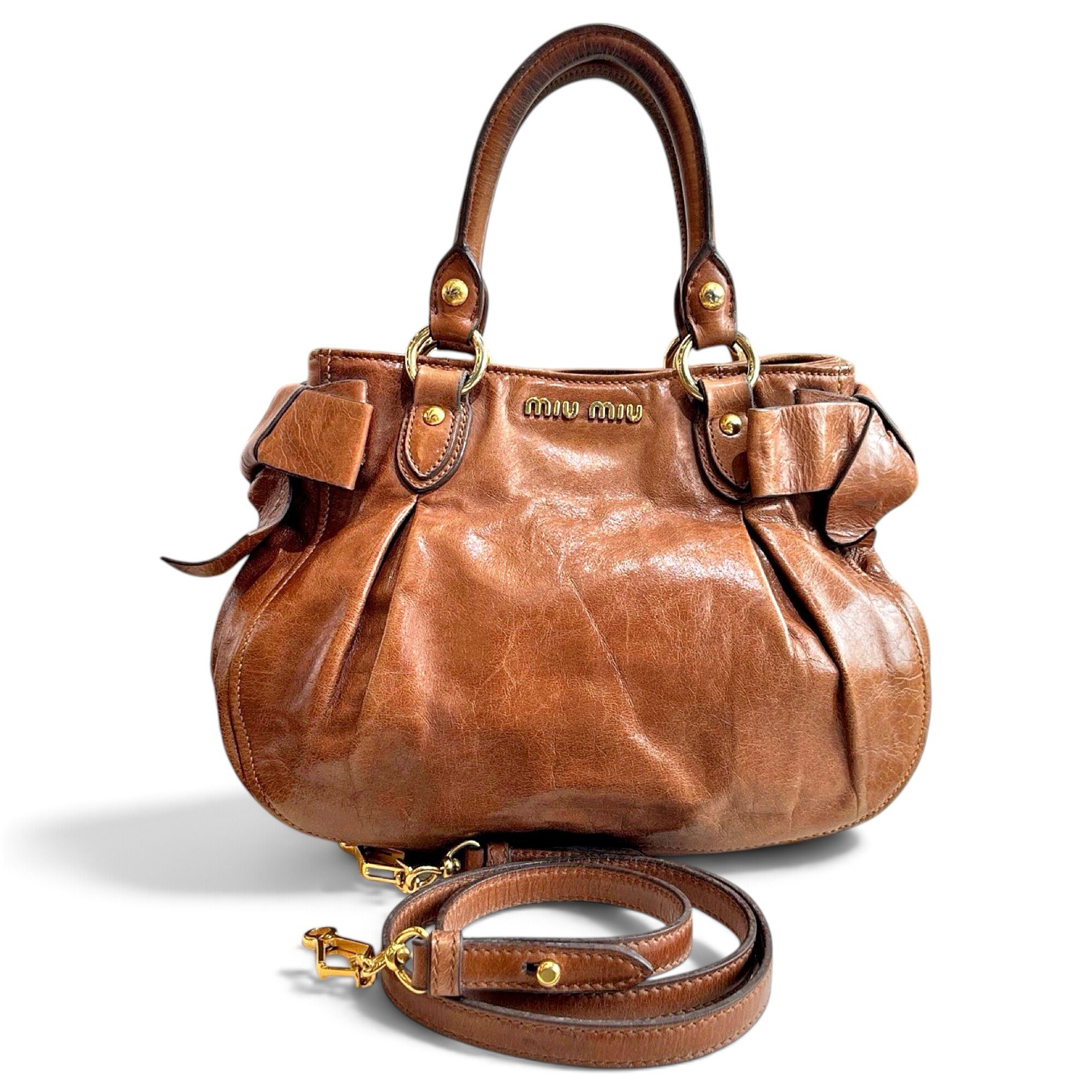 Bow bag leather handbag