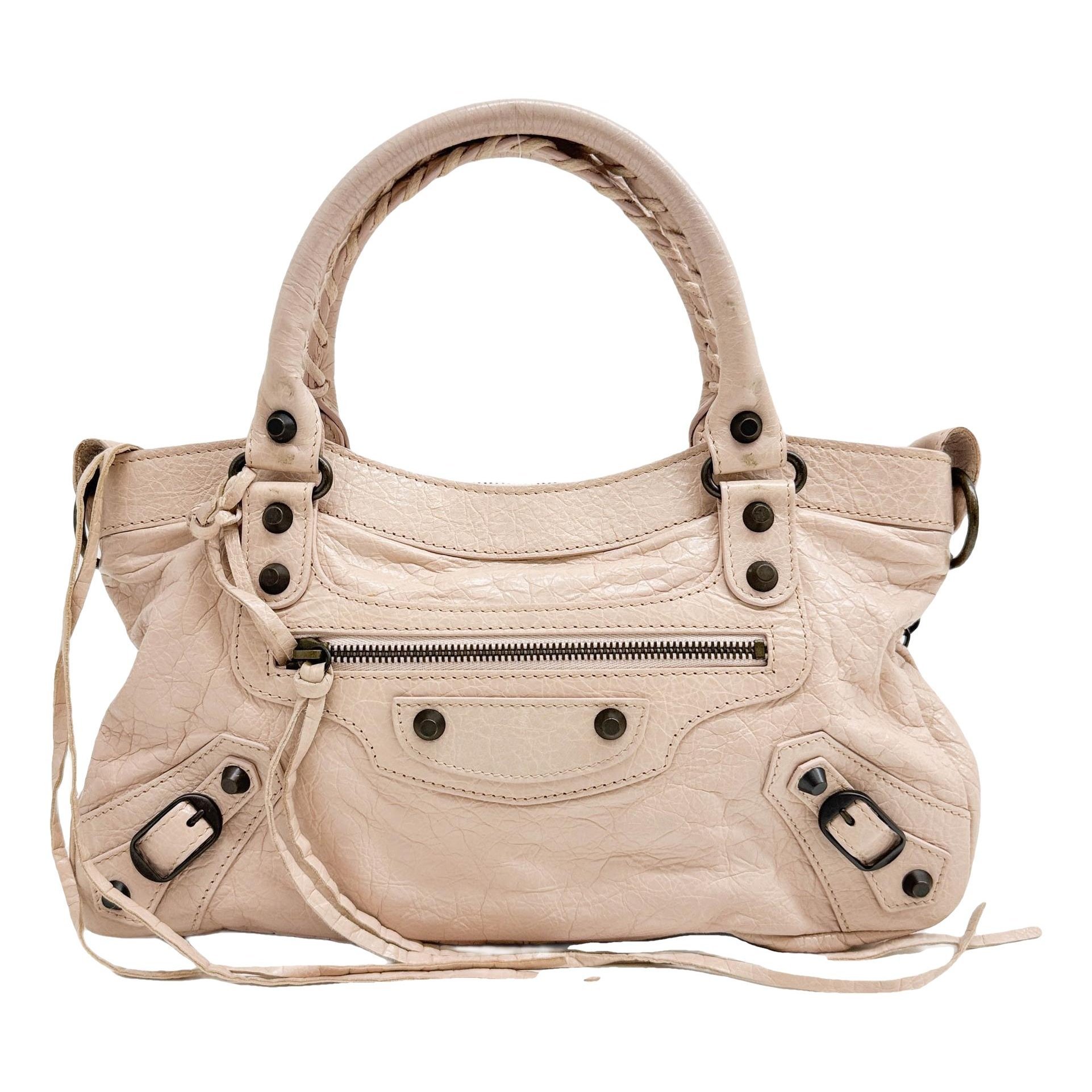 First leather handbag