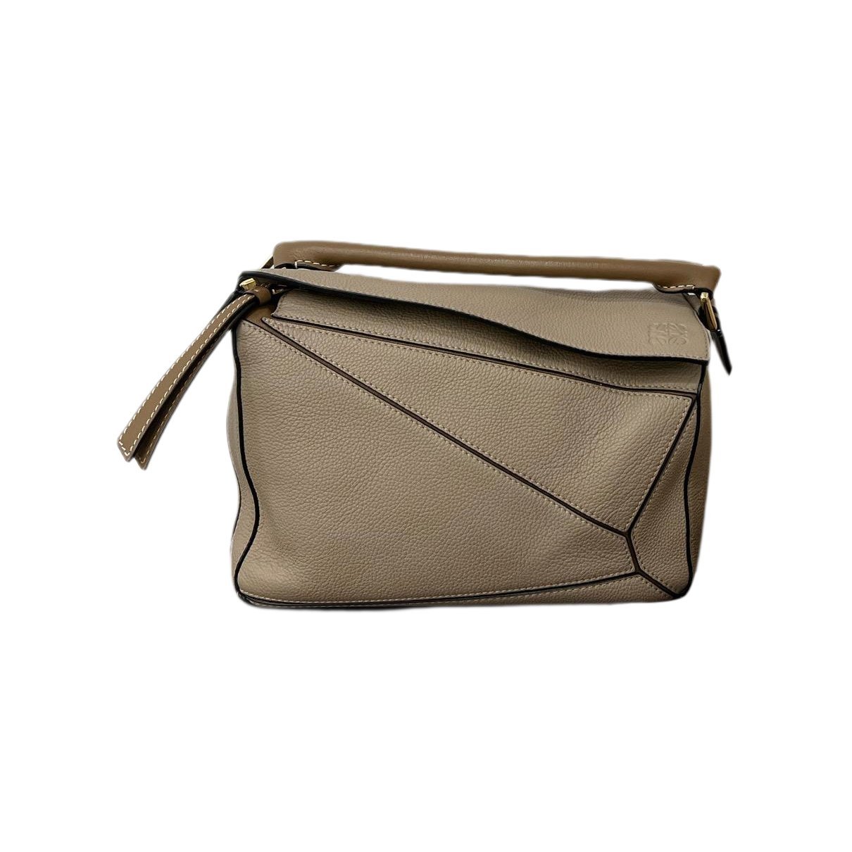 Puzzle leather handbag