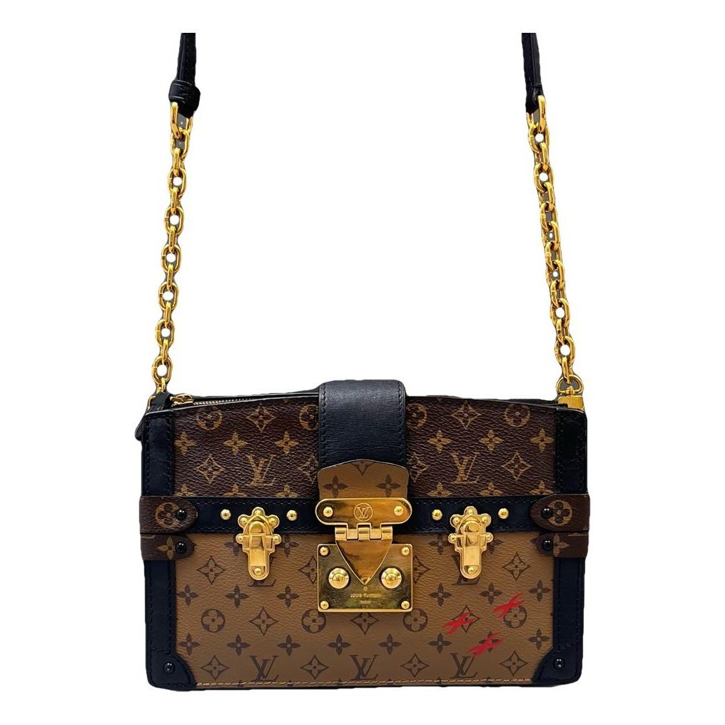Pochette Trunk leather handbag