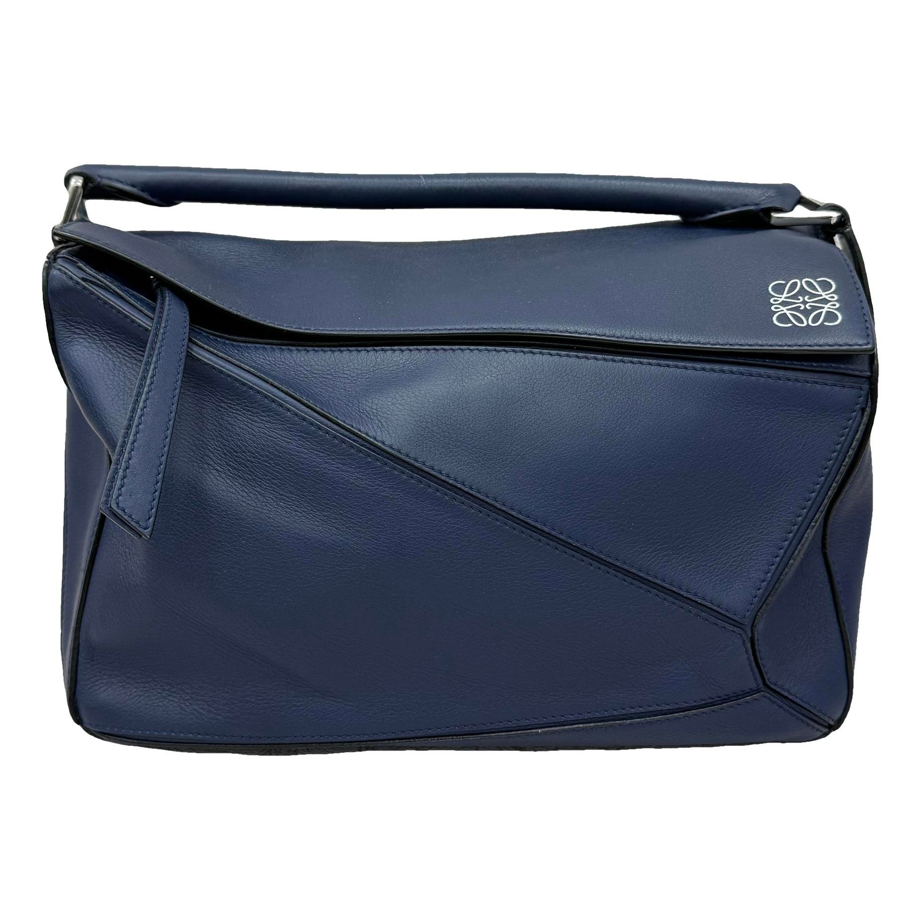Puzzle leather handbag