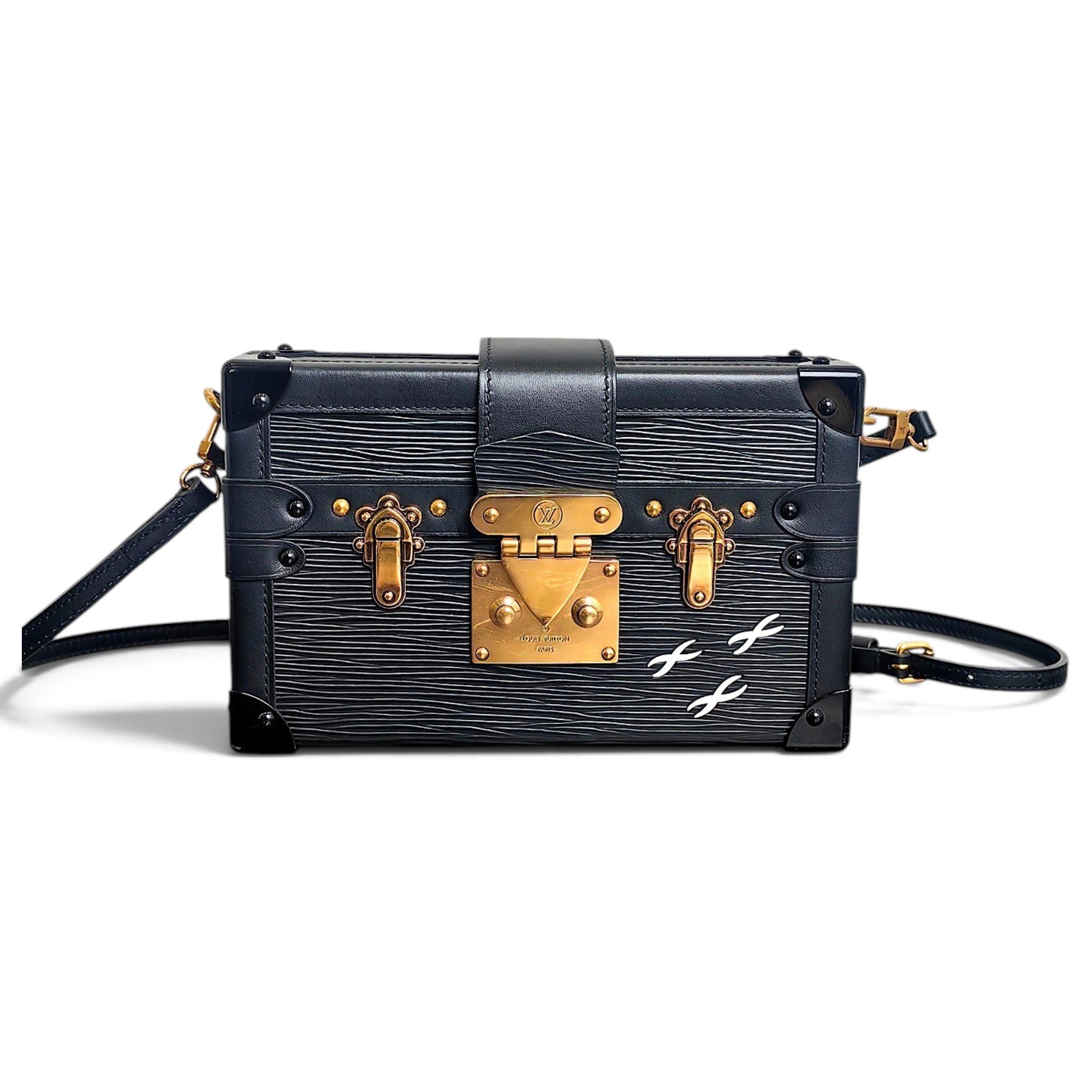 Pochette Trunk leather handbag