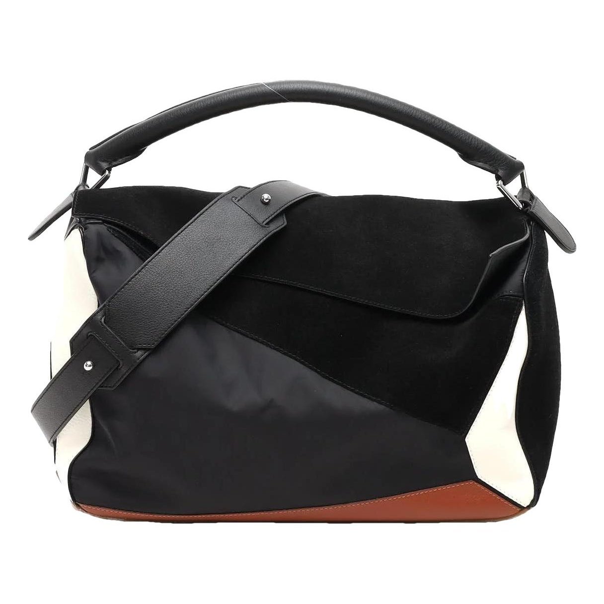 Puzzle leather handbag