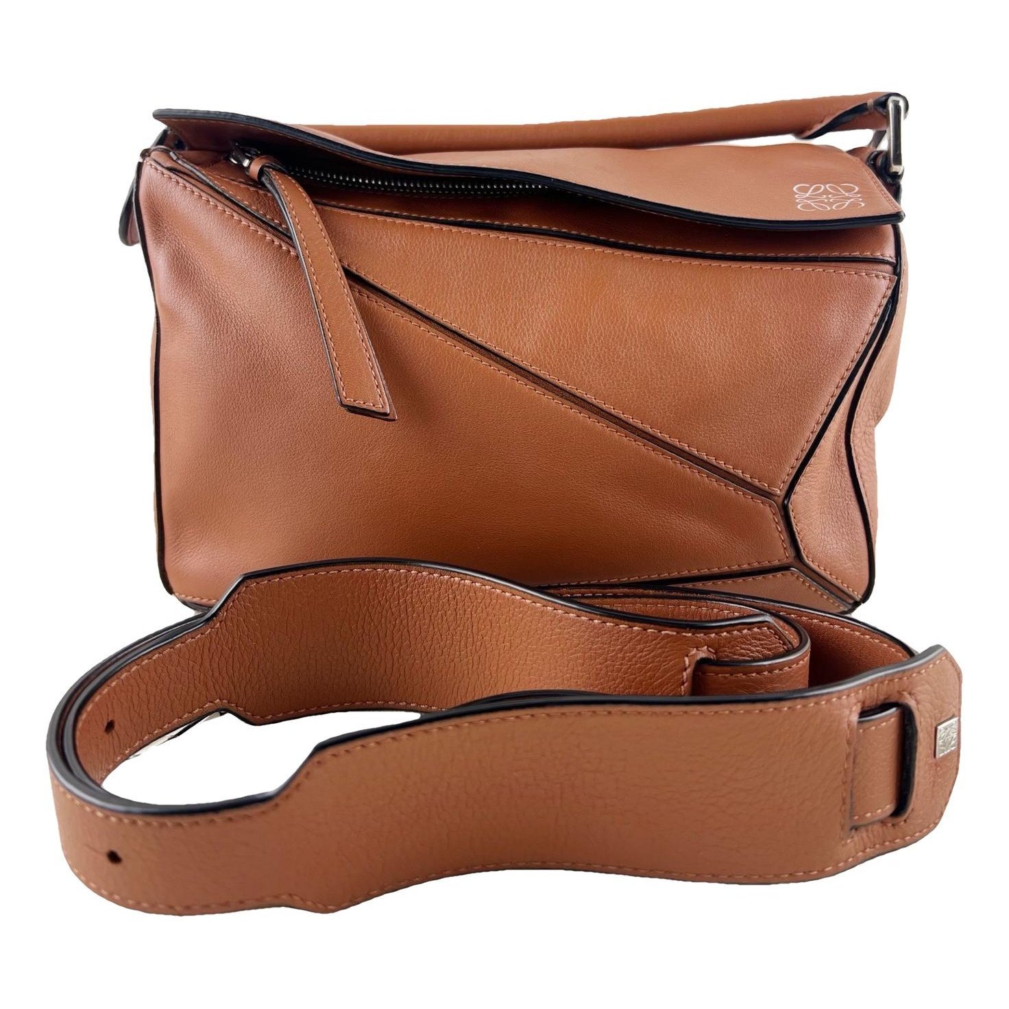 Puzzle leather handbag