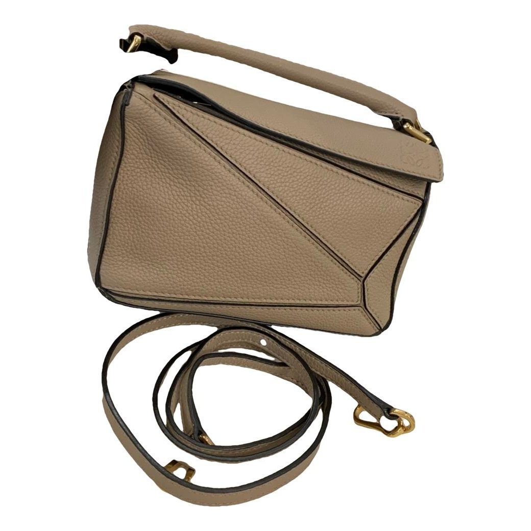 Puzzle leather handbag