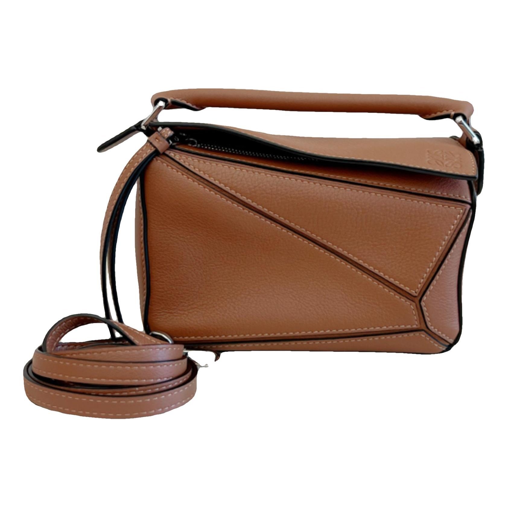 Puzzle leather handbag