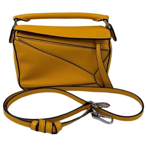 Puzzle leather handbag