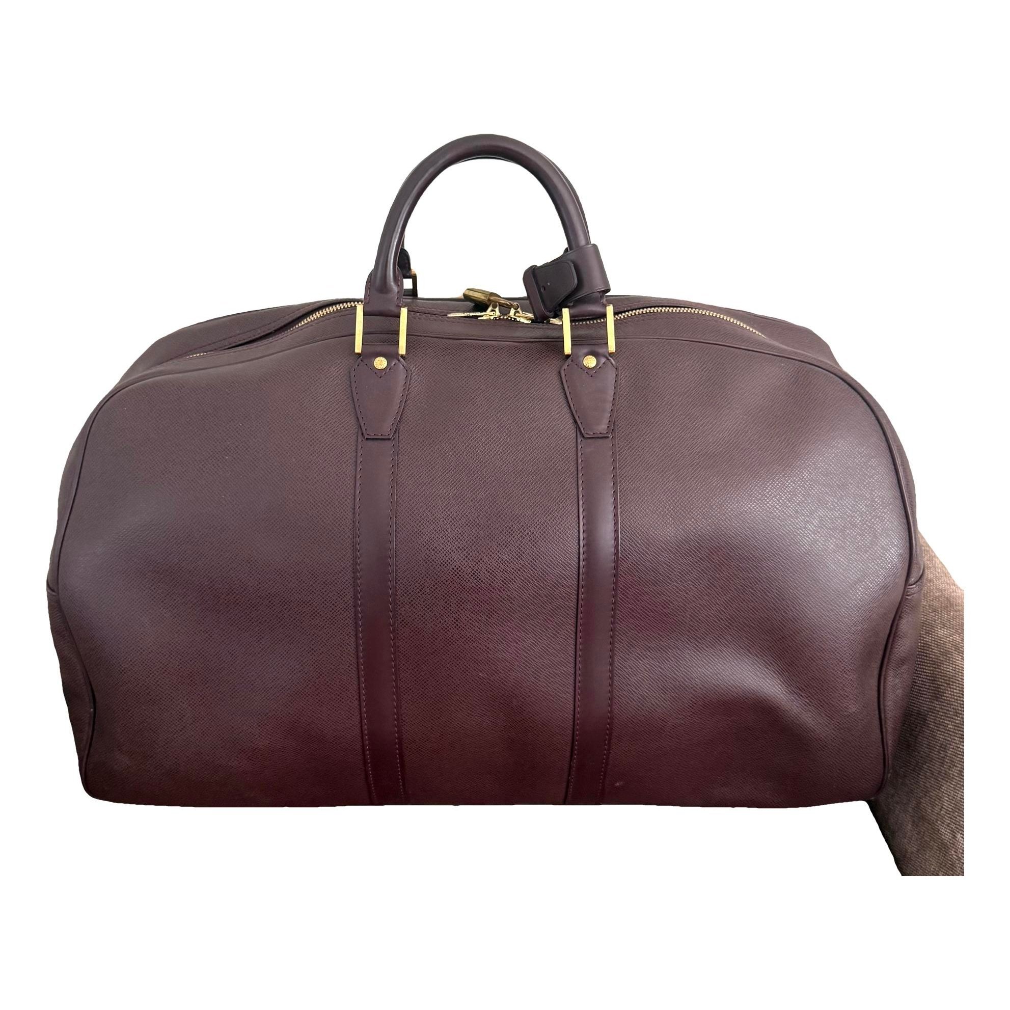 Patent leather travel bag