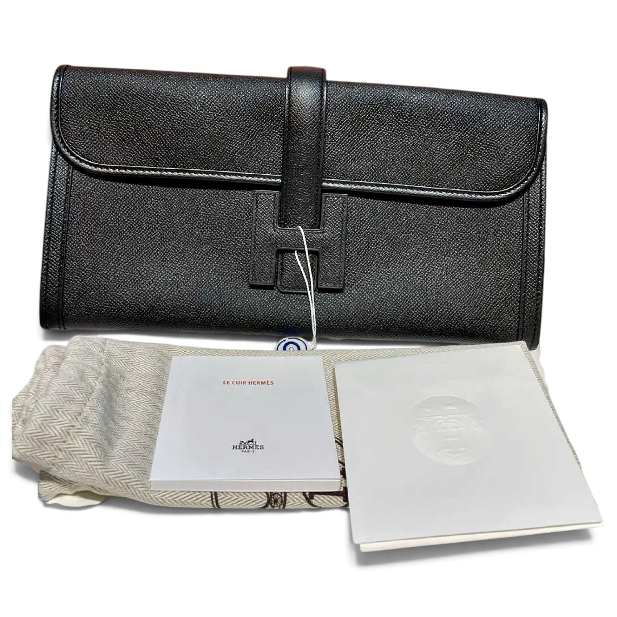 Jige leather clutch bag