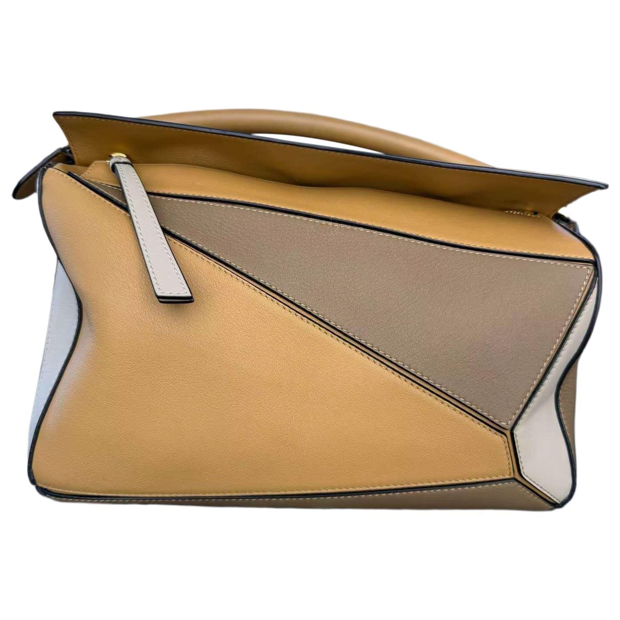 Puzzle leather handbag