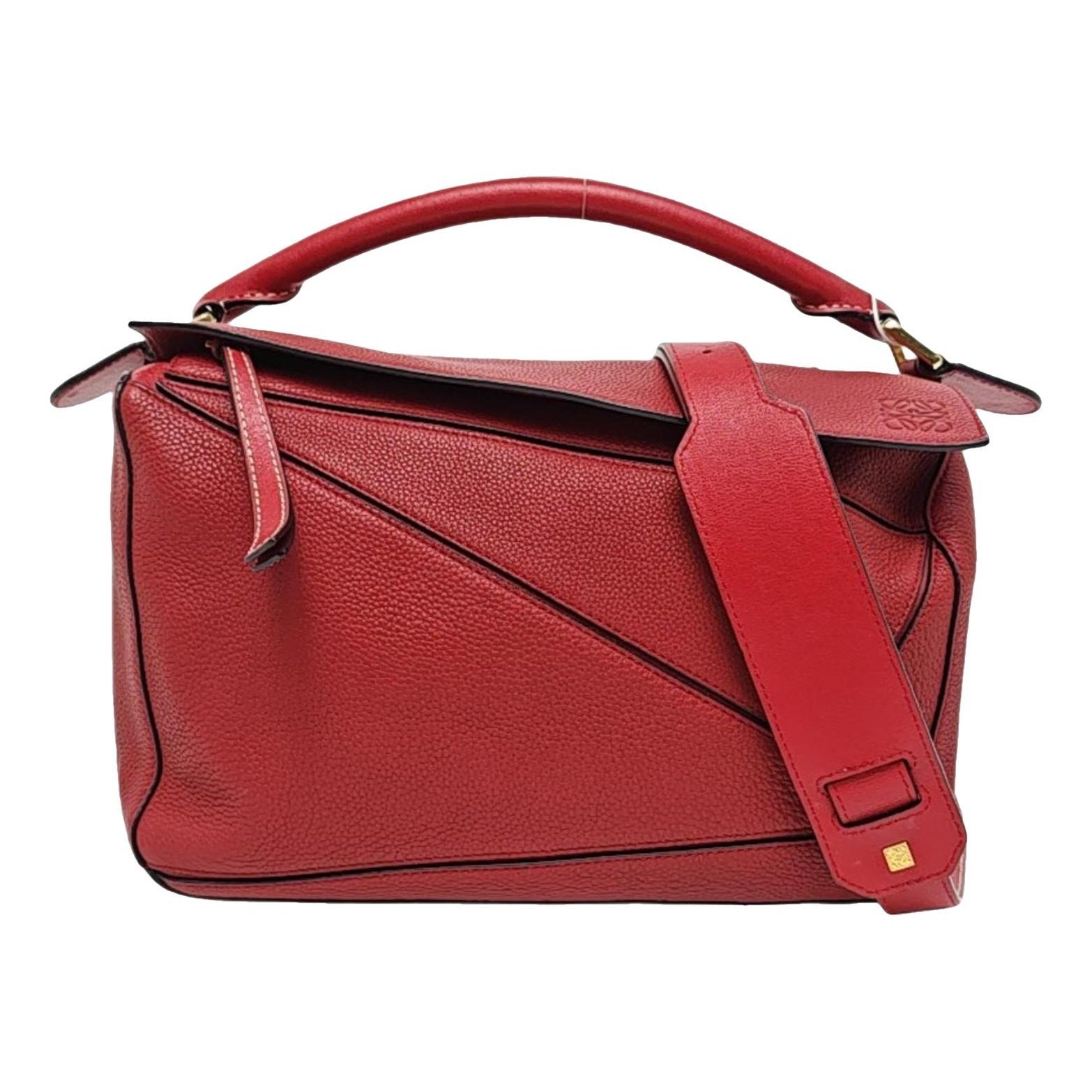 Puzzle leather crossbody bag