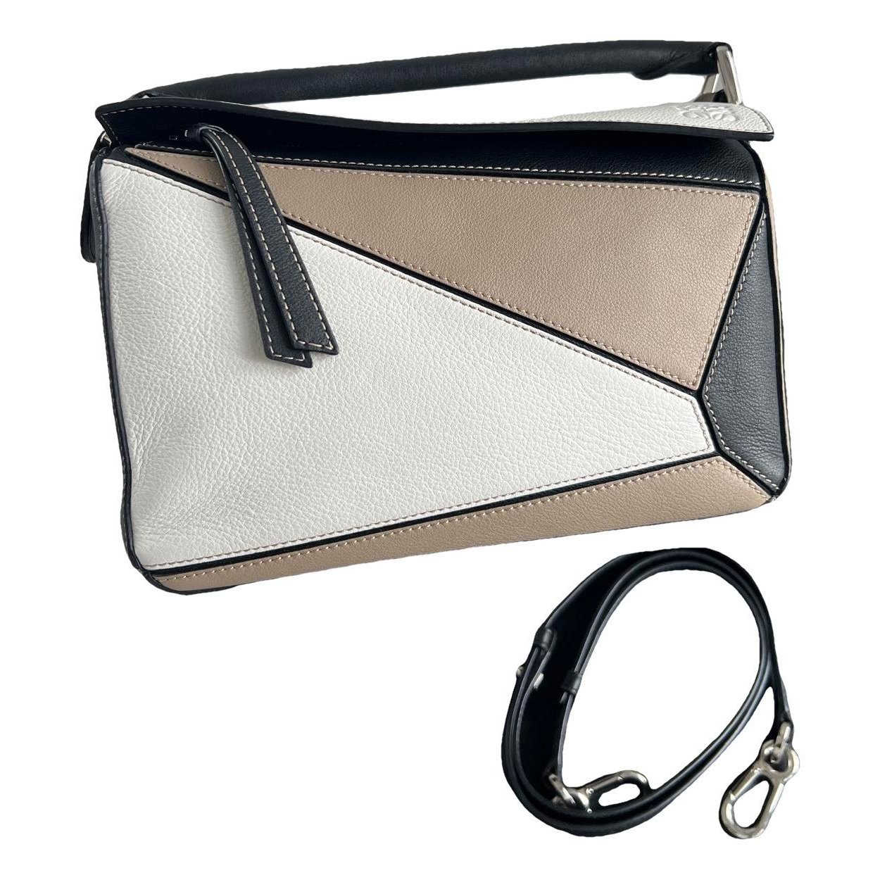 Puzzle leather handbag