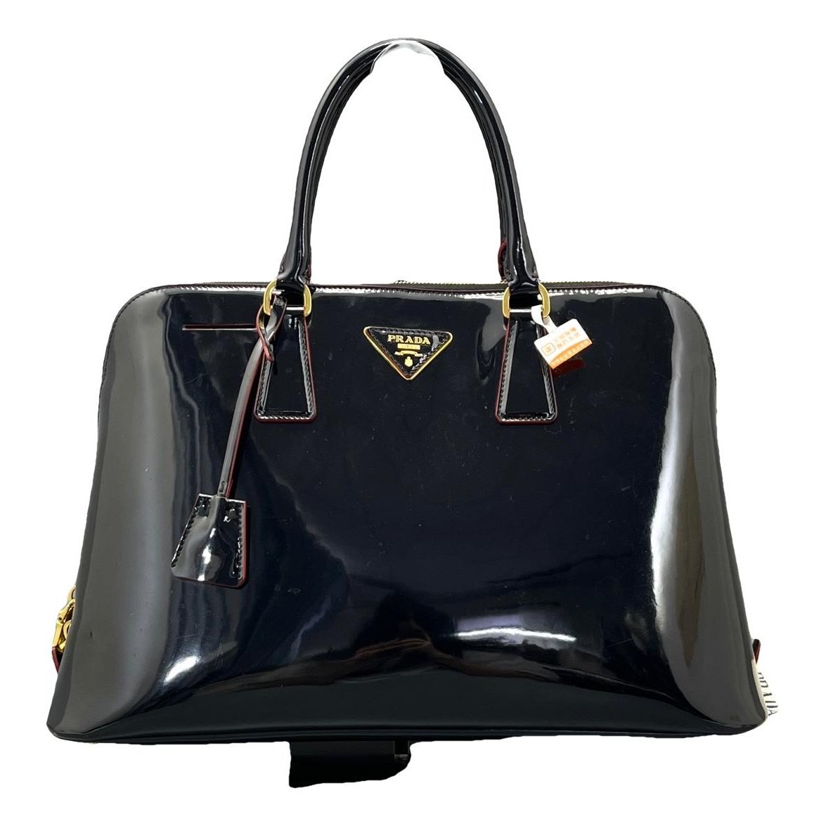 Pyramid patent leather handbag