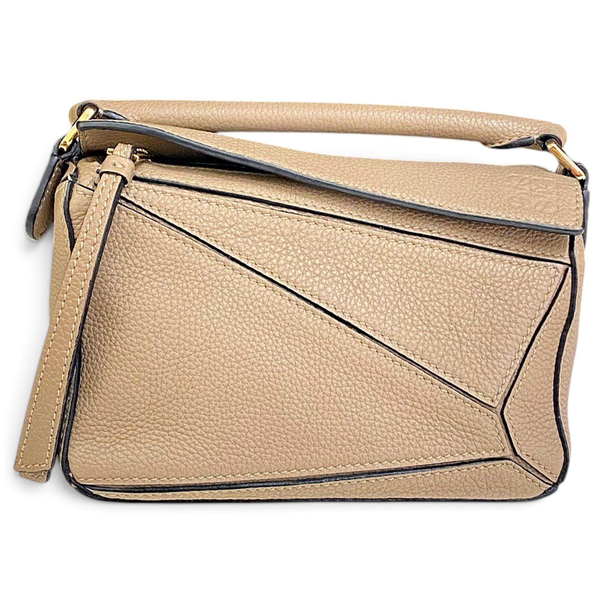 Puzzle leather handbag