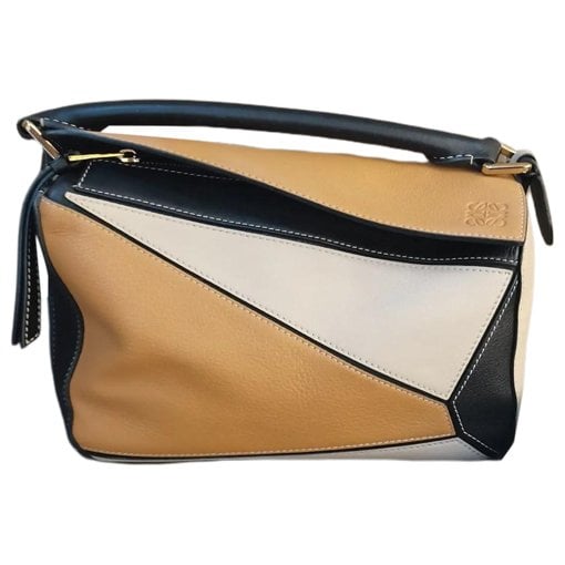 Puzzle leather handbag