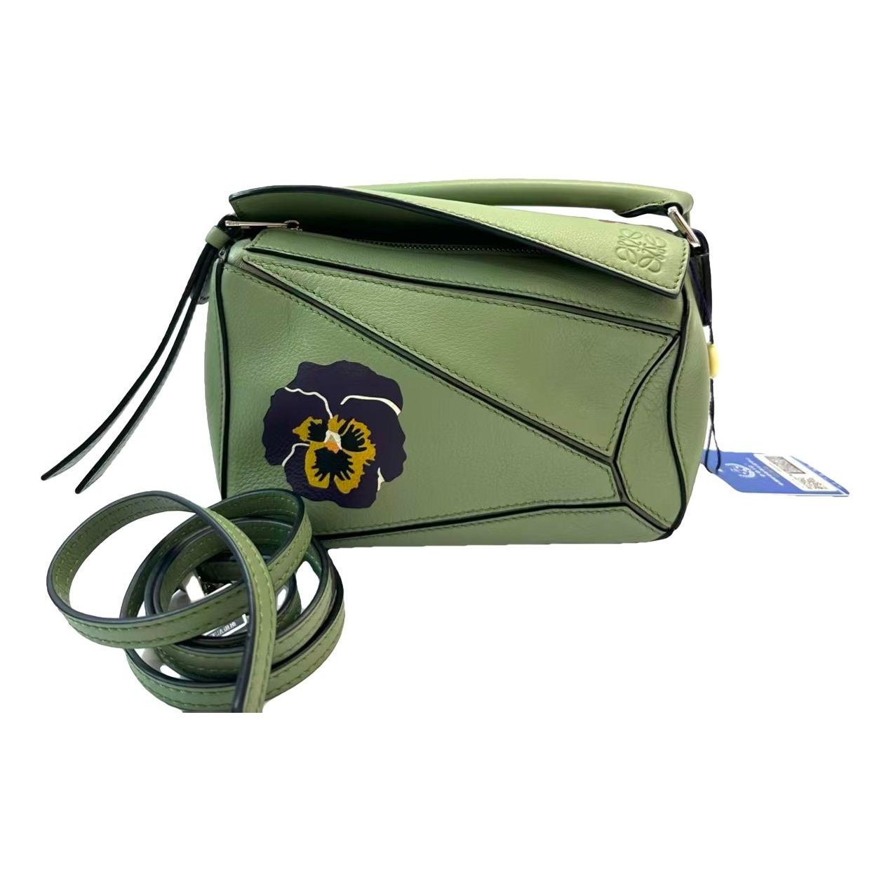 Puzzle leather handbag