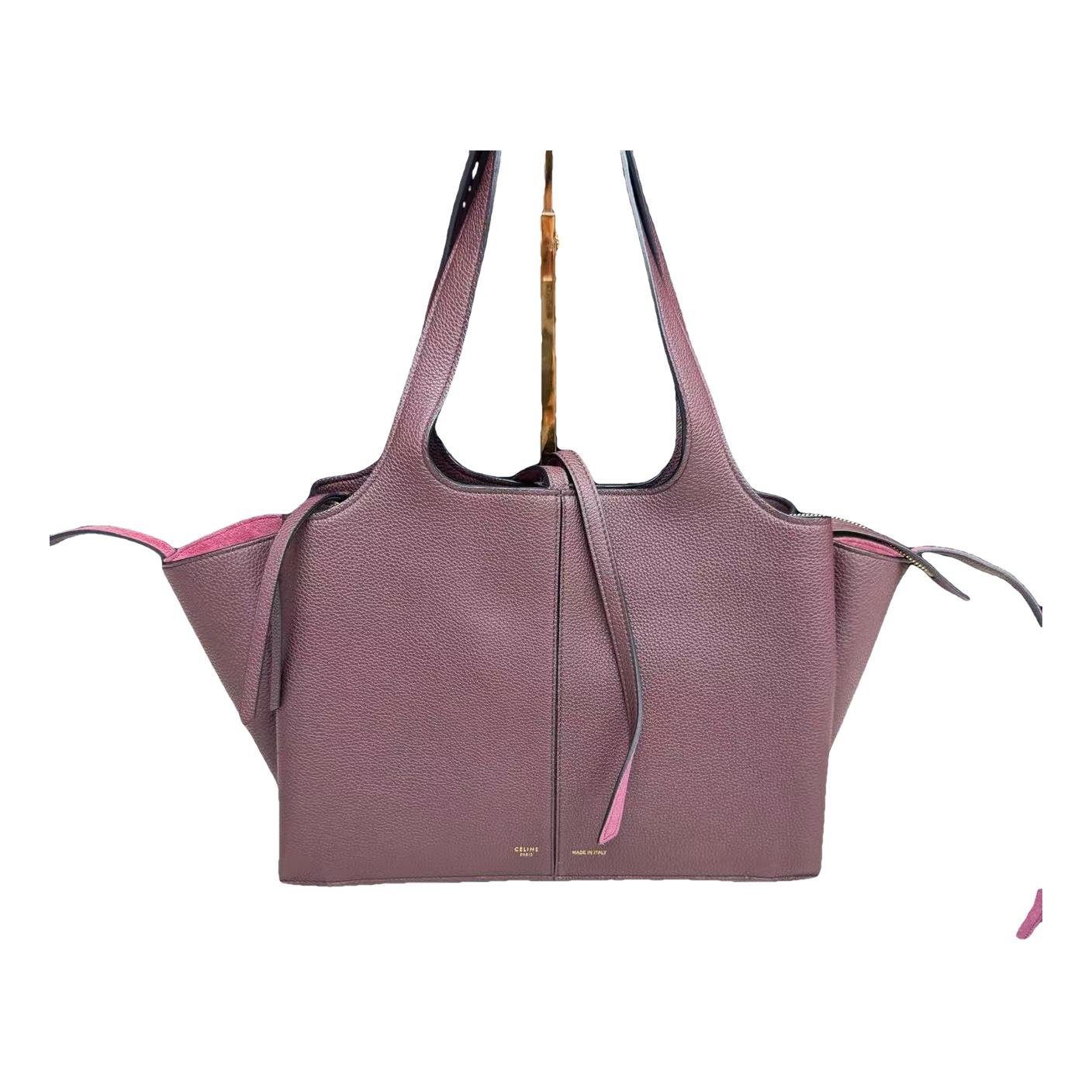 Tri-Fold leather handbag