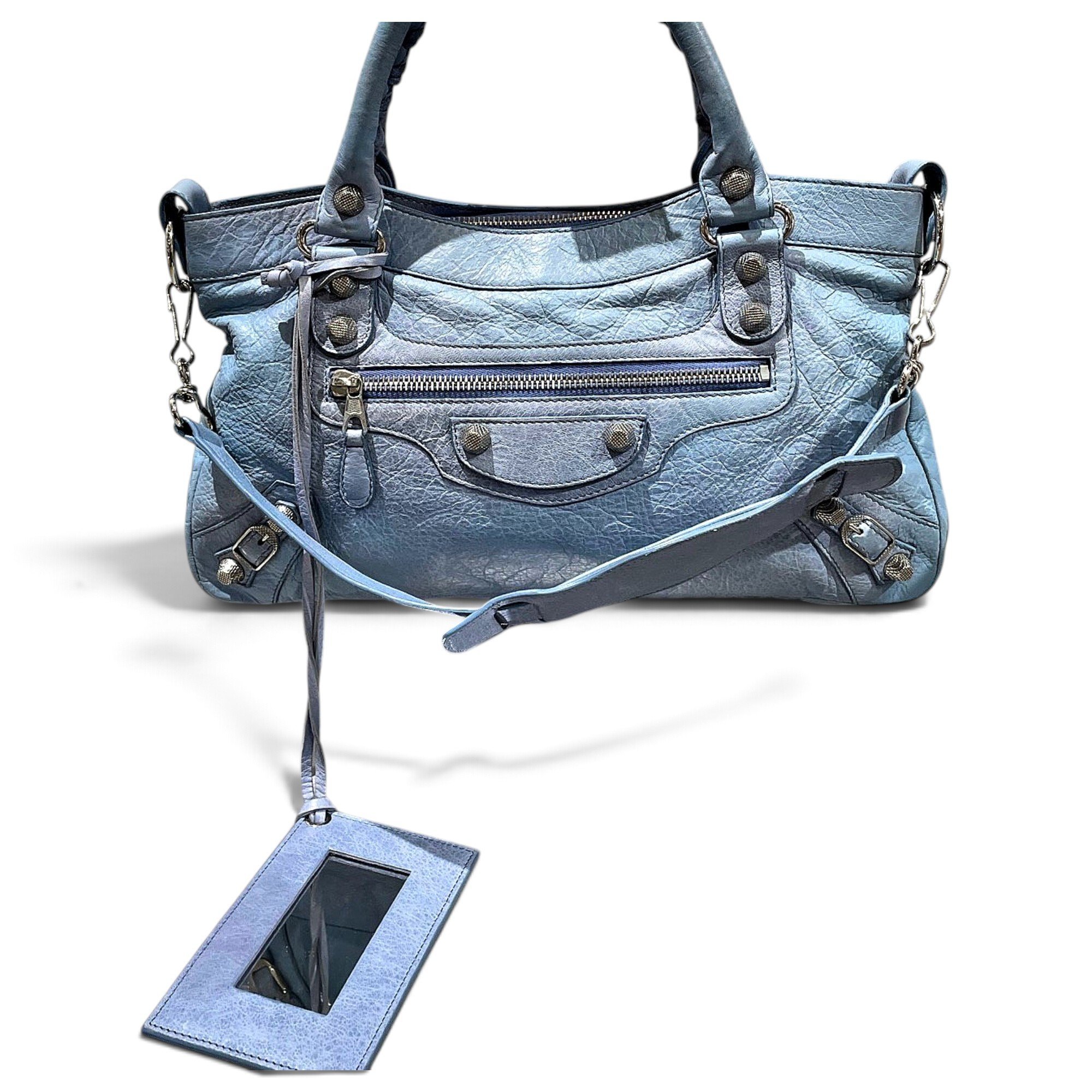 First leather handbag