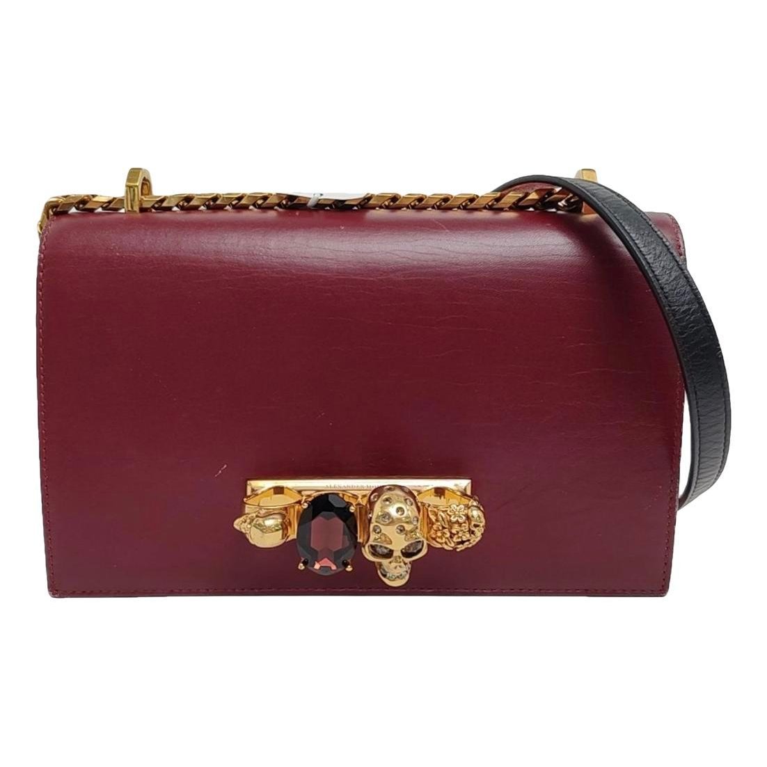 Knuckle leather crossbody bag