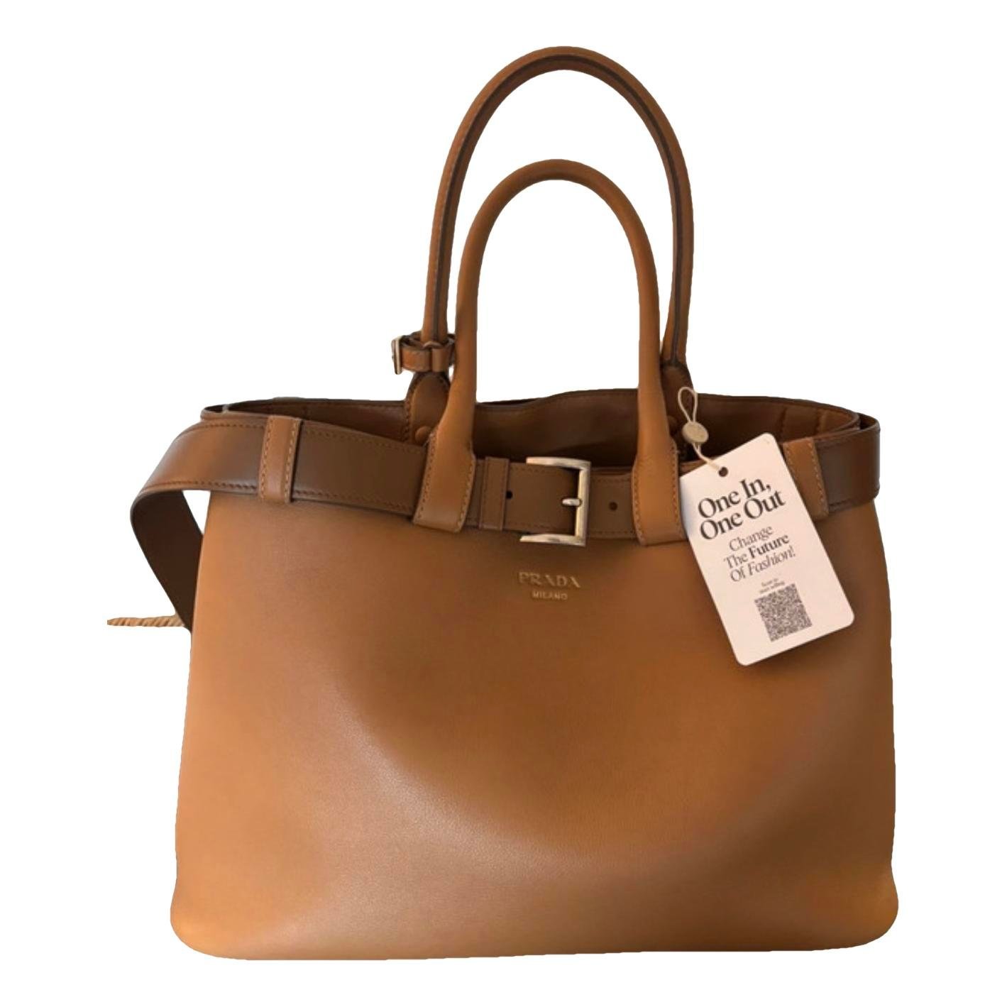 Buckle leather handbag