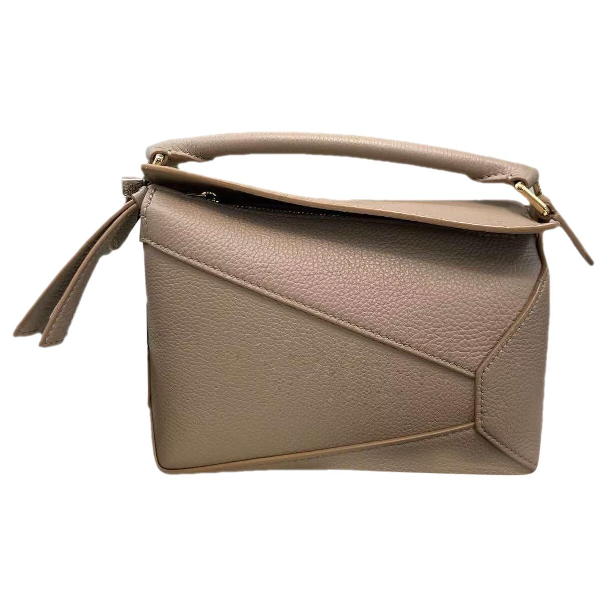 Puzzle leather handbag