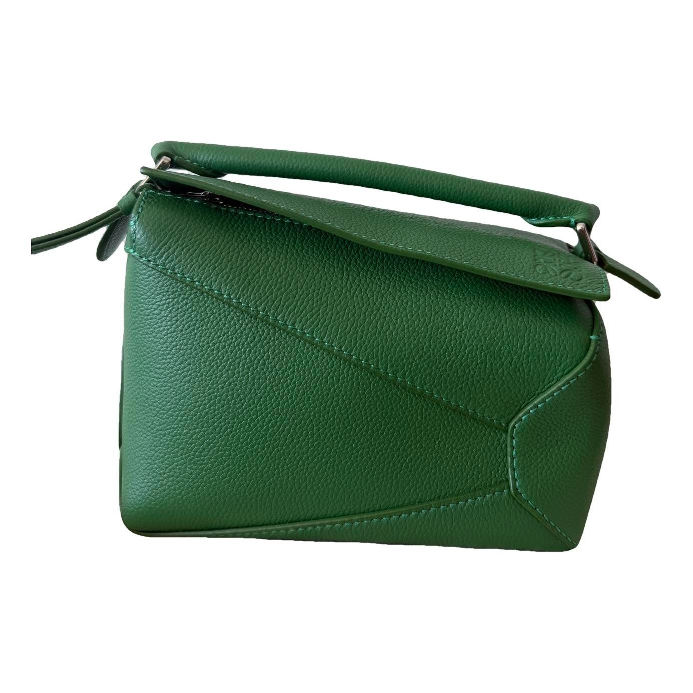 Puzzle leather handbag